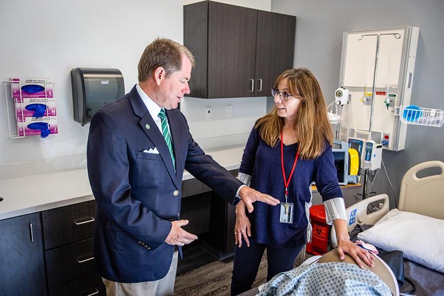Northwest President Dr. Lance Tatum learns about the educational tools and opportunities available to nursing students at North Central Missouri College's Savannah Campus on Monday.